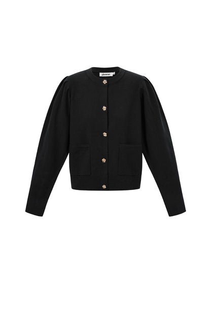 Vest met bloemen knopen