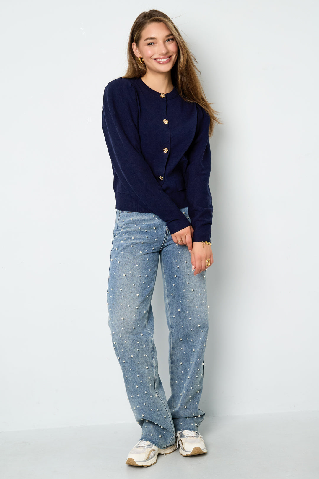 Vest met bloemen knopen