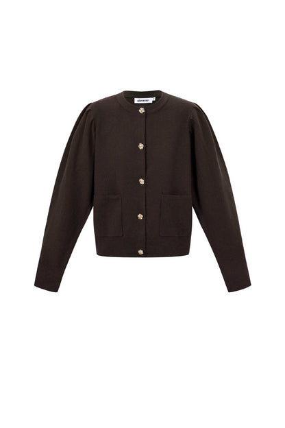 Vest met bloemen knopen